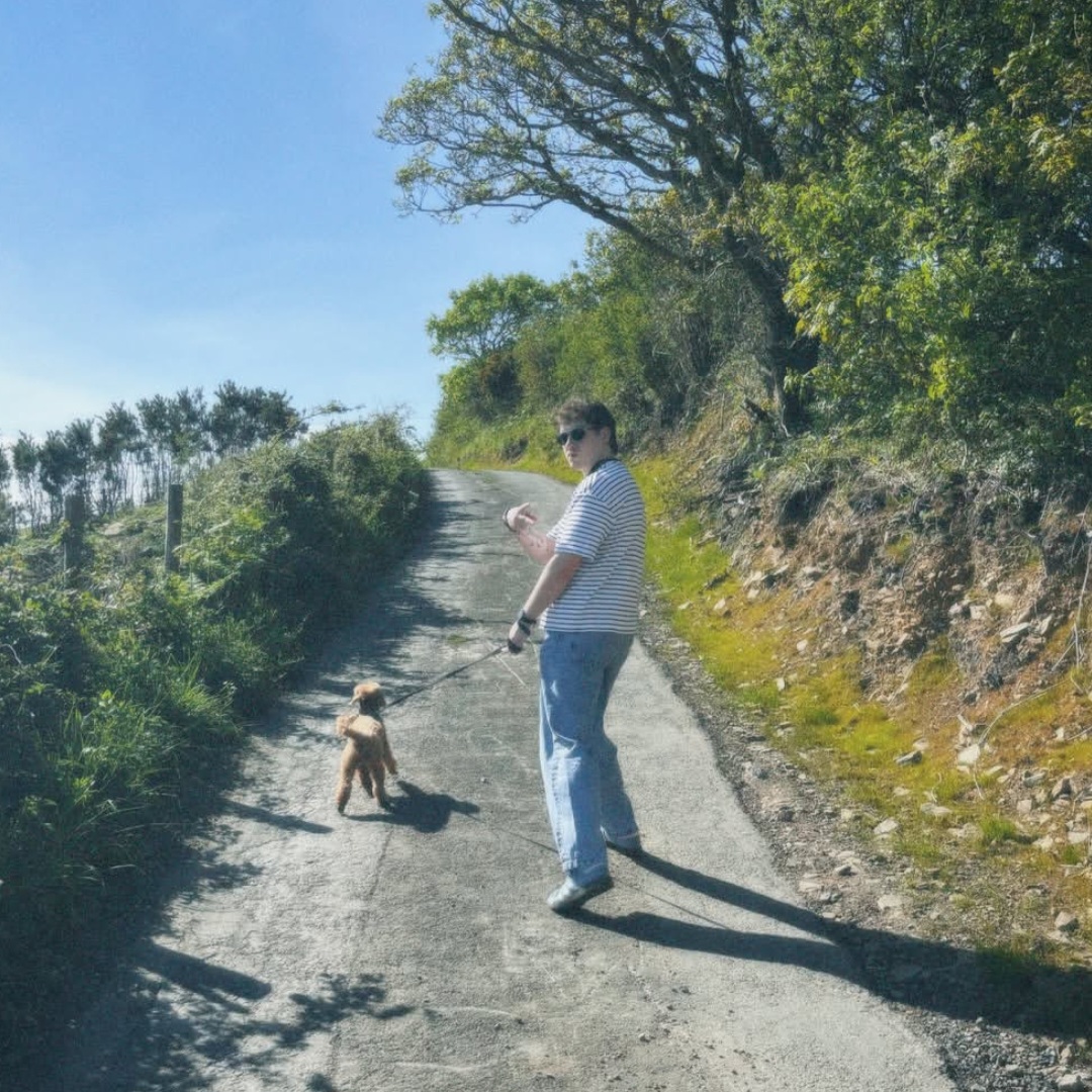 Artist Brook Fox with a dog