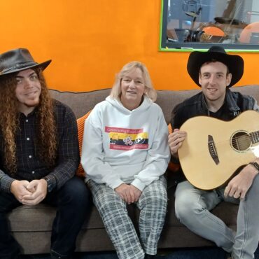 Kori, Kym and Cole sat in Newport City Radio HQ.
