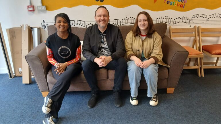 Zoila, Ramone and Amber sat in Newport City Radio