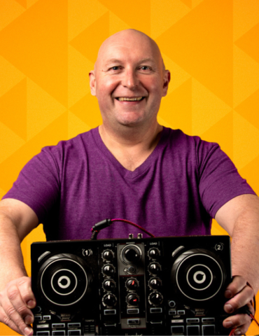 Lamsie with dj controller and purple t-shirt