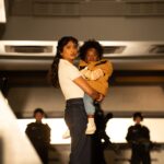 Belinda and Poppy stood in UNIT.