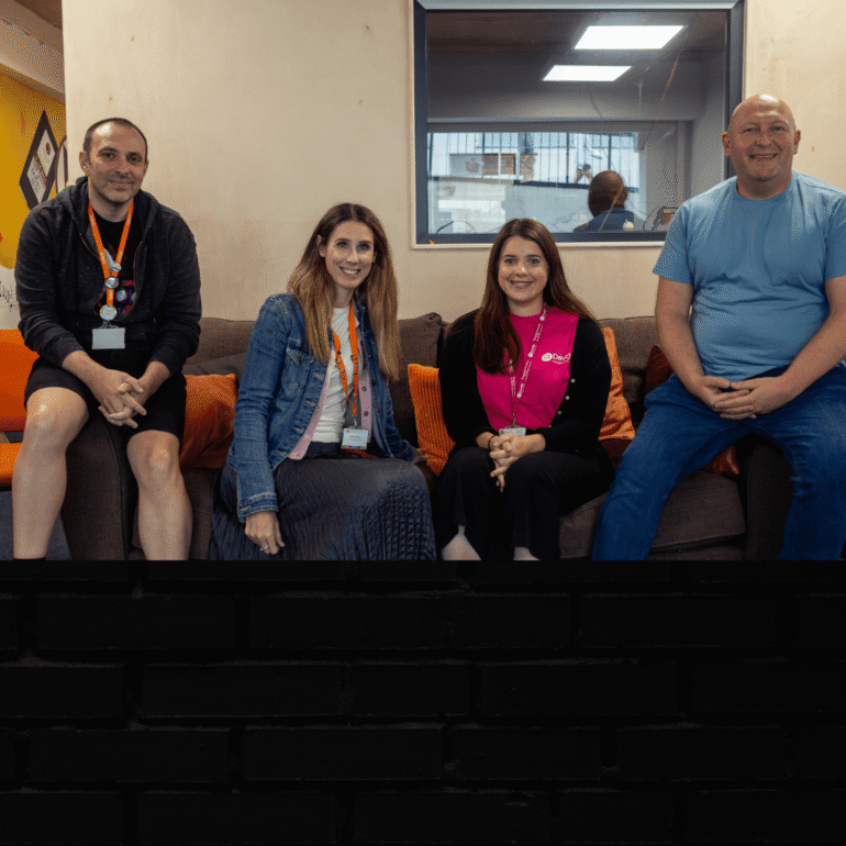 Photo of Abi from St Davids Hospice with Dan and Kelly from GAVO and Lamsie