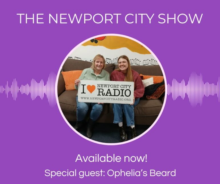 Kym sat on sofa with Ophelia from Ophelia's Beard