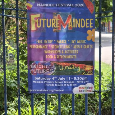 Photo of the 2026 Maindee Festival Banner on school fence