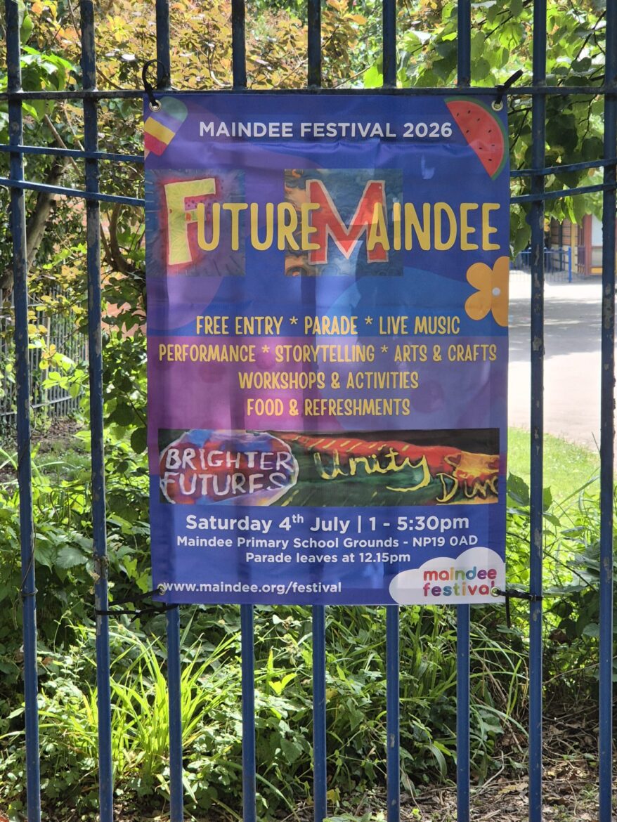 Photo of the 2026 Maindee Festival Banner on school fence